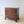 Load image into Gallery viewer, Antique George III mahogany chest of drawers with four graduated drawers and brass swan-neck handles, raised on shaped bracket feet.
