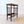 Load image into Gallery viewer, Antique Arts &amp; Crafts oak reading table bookstand featuring turned mashrabiya moorish spindle-lattice side panels, raised on turned legs with brass and ceramic wheel castors.
