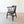 Load image into Gallery viewer, Antique Victorian elm and ash Captain's desk chair with tablet crest rail, arm bow, turned spindles, dished seat, and turned legs with H-stretcher.

