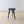 Load image into Gallery viewer, Antique Victorian ebonised hardwood occasional table featuring a deeply chip-carved circular top raised on three turned and carved threaded splayed legs.
