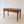Load image into Gallery viewer, Antique Victorian mahogany writing table with a patinated black leathercloth inset writing surface over two drawers on ring-and-ball turned legs.
