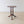 Load image into Gallery viewer, Antique Regency mahogany octagonal occasional table with a stepped edge top, three turned pillars, a triform platform, and down-swept legs.
