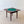 Load image into Gallery viewer, Antique Edwardian mahogany diminutive envelope card table with a swivelling top, green baize surface and a frieze drawer on four square legs.
