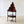 Load image into Gallery viewer, Antique Regency mahogany corner stand with a graduated superstructure, bow-fronted frieze drawer, ring-turned columns, and out-swept splayed legs.
