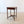 Load image into Gallery viewer, Antique George III mahogany and burr yew occasional table with a bookmatched top, square tapering legs, and swept stretchers supporting an undertier.
