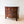Load image into Gallery viewer, Antique George III flame mahogany bowfront chest of drawers with two short and two long graduated drawers, brass handles, and splayed bracket feet.
