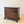 Load image into Gallery viewer, Antique George II mahogany chest of drawers with a single‑plank moulded top, four graduated cockbeaded drawers with pierced fret brass hardware, and ogee bracket feet.

