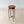 Load image into Gallery viewer, Antique Edwardian painted satinwood candle stand featuring an octagonal top decorated with a musical trophy medallion, raised on square-tapered legs with an X-form stretcher.
