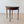 Load image into Gallery viewer, Antique Edwardian mahogany demilune fold-over card table featuring geometric crossover inlay, a green playing surface, and square tapered legs on castors.
