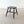 Load image into Gallery viewer, Antique Victorian English elm low country stool with a thick figured top, raised on splayed turned beech legs united by an ash H-stretcher.

