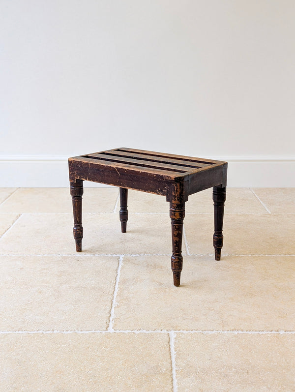 Antique Victorian beech luggage stand by Brown & Lamont of Chester, featuring a slatted platform top with broad open rails on turned legs.

