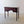 Load image into Gallery viewer, Antique Regency mahogany kneehole writing table with three cockbeaded drawers, central arched kneehole, turned front legs, and plain square tapered rear legs.
