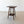 Load image into Gallery viewer, Antique Edwardian Sheraton Revival mahogany occasional table featuring a central boxwood fan patera, double line stringing, and splayed square tapered legs with an undertier.
