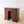 Load image into Gallery viewer, Warm mahogany kneehole desk featuring satinwood crossbanding, oval shell inlays and nine drawers with a recessed cupboard on bracket feet.
