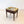 Load image into Gallery viewer, Antique Edwardian mahogany piano stool with a floral needlepoint seat opening to internal storage, framed in boxwood stringing, raised on tapering legs.
