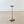 Load image into Gallery viewer, Antique early 20th century brass cigar stand with a dished tray featuring tortoises and acorn finial on a faux-bamboo column and tortoise base.
