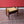 Load image into Gallery viewer, Antique Edwardian Arts &amp; Crafts Mahogany Piano Stool with Storage
