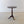 Load image into Gallery viewer, Antique George III solid mahogany tilt-top tripod table with a circular top, turned column stem, and cabriole legs with scroll feet.
