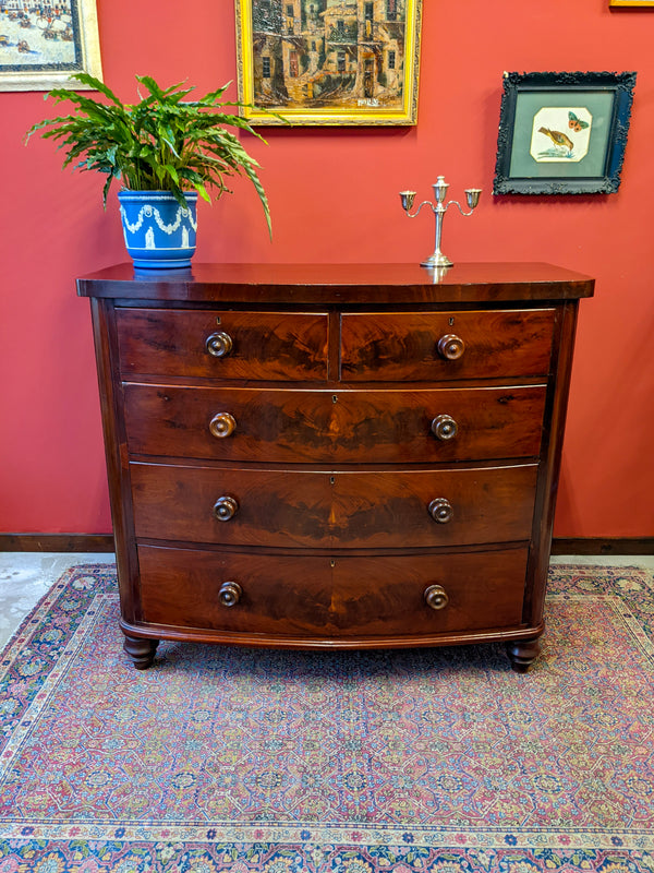 19th Century Bow Front Flame Mahogany Chest of Drawers