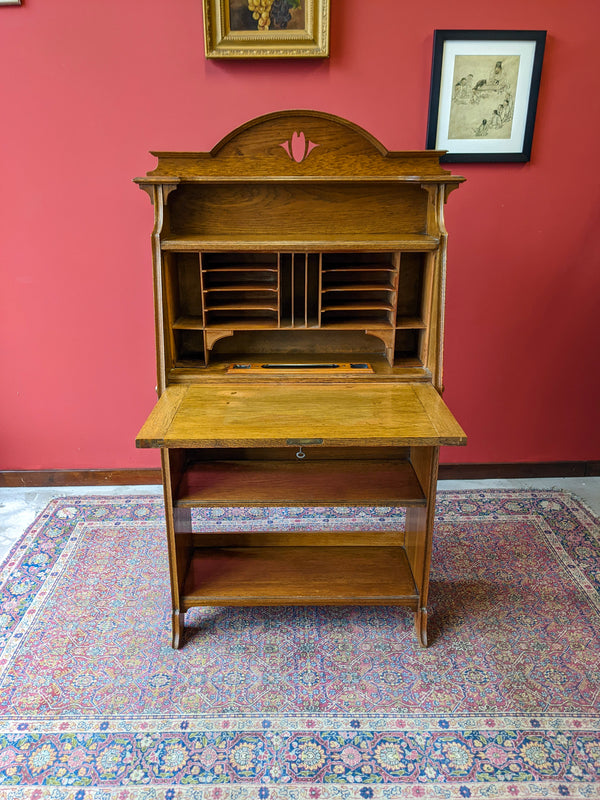 Antique Arts & Crafts Narrow Oak Fall Front Bureau Writing Desk Bookcase in the Manner of Liberty & Co
